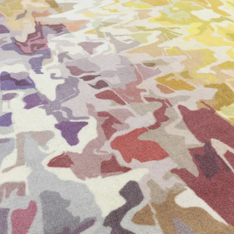 Multicoloured abstract patterned area rug with purple, red, yellow and beige tones