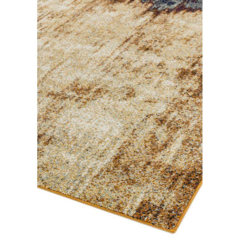 Beige and brown abstract area rug with textured pattern, corner close-up