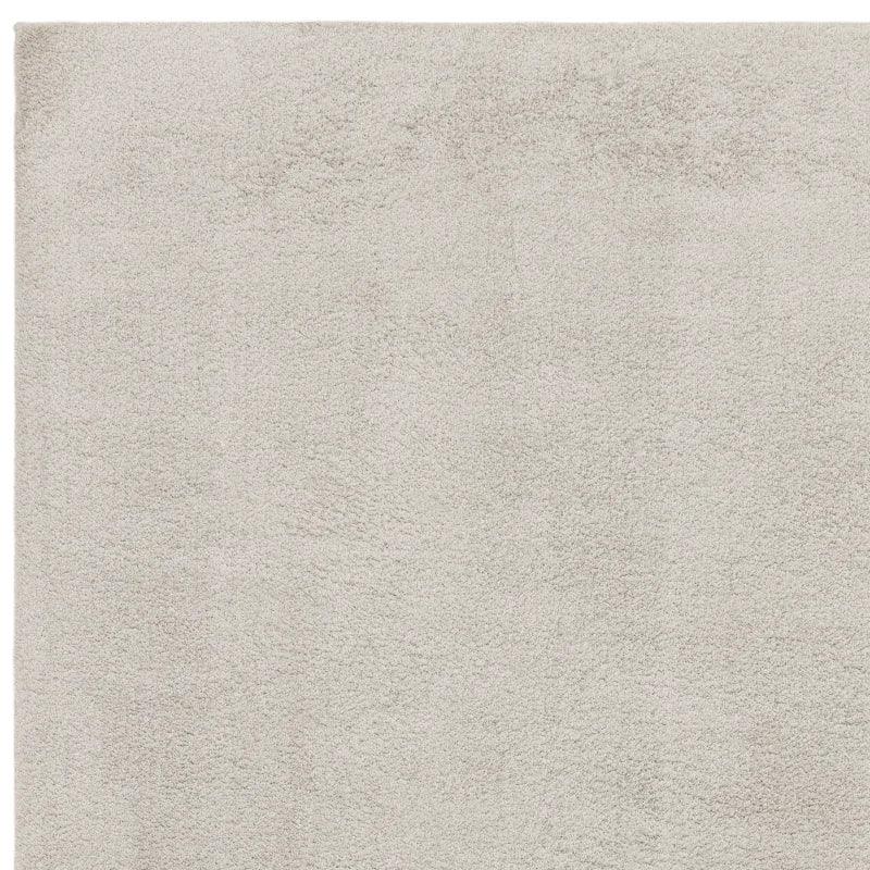Light grey shaggy rug with soft texture and high pile, shown from top angle