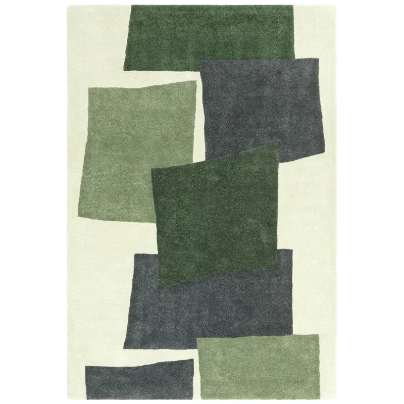 Green and grey abstract modern rug with geometric blocks on cream background