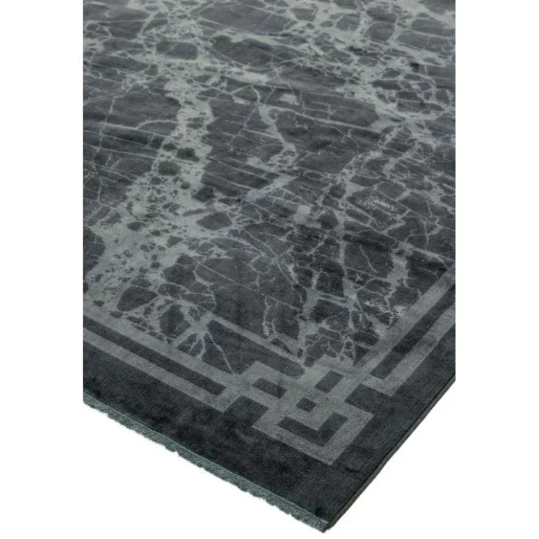 Dark grey marble effect rug with geometric border corner detail