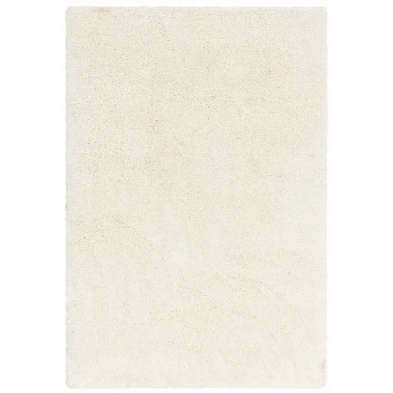 cream shaggy rug with soft texture, rectangular shape, top-down view