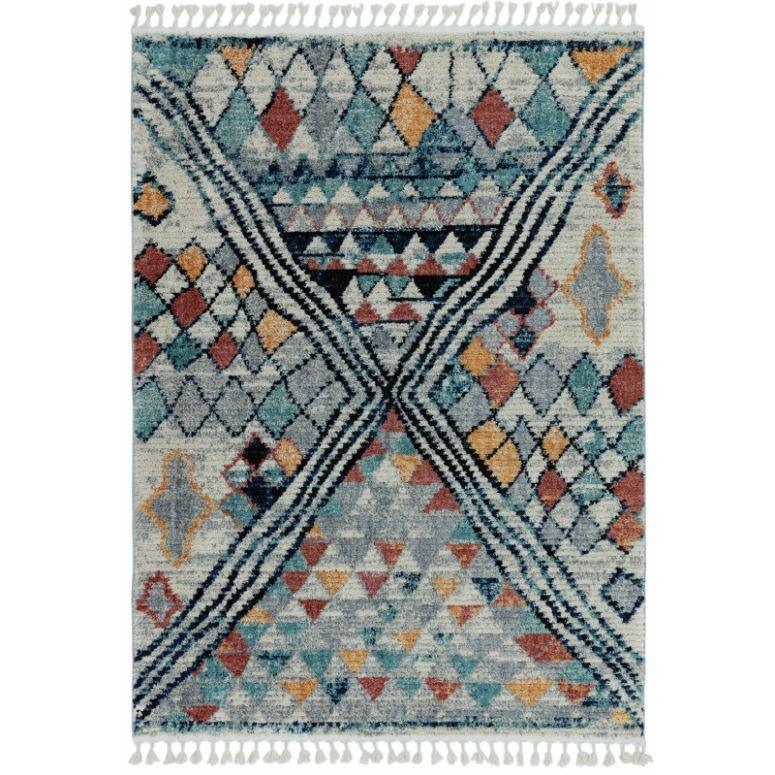 Geometric patterned rug with blue, red, and yellow diamond shapes and tassel edges