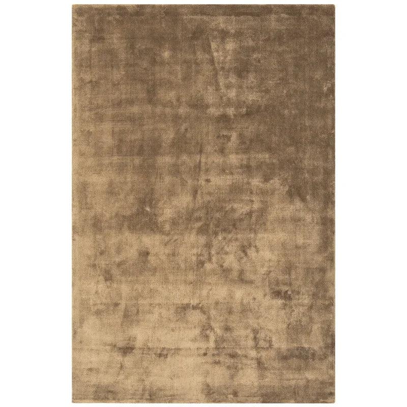 Rectangular brown velvet rug with a soft texture and subtle sheen
