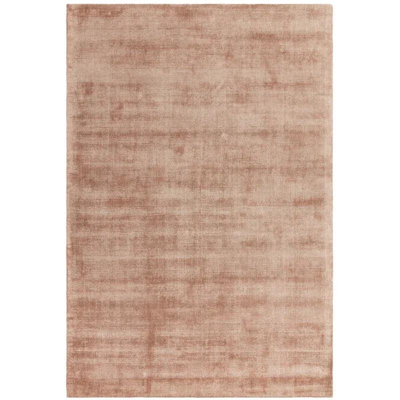 Blush pink area rug with soft velvety texture shown from above