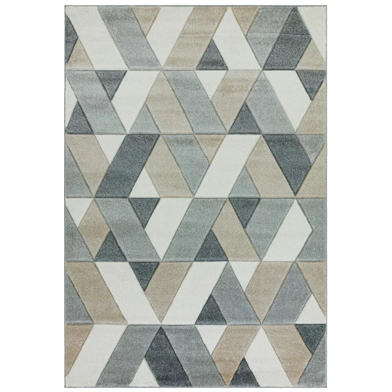 Geometric area rug with grey, beige, and cream triangles in a modern pattern