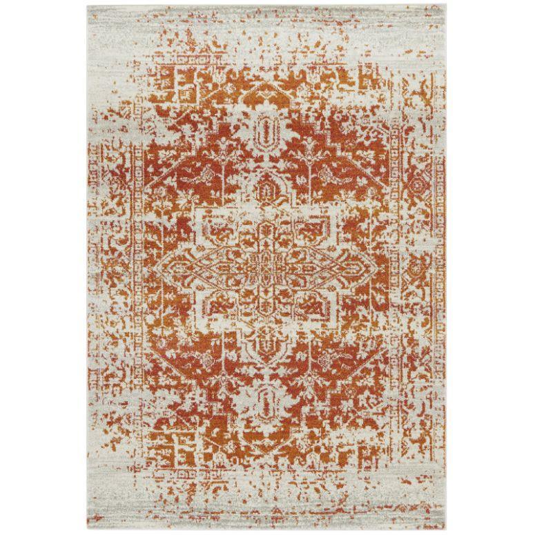 Rust red patterned area rug with vintage distressed look and intricate central medallion design