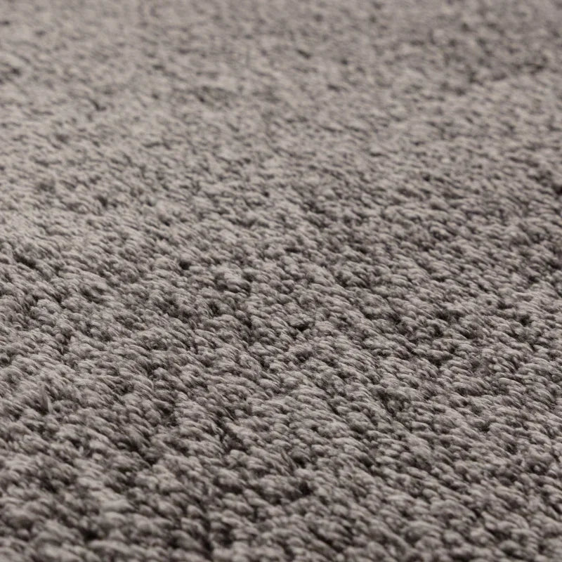 Closeup of grey carpet texture with soft pile