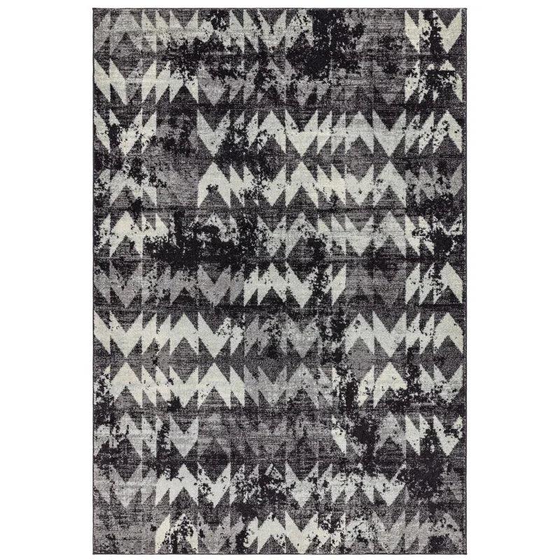 Grey geometric pattern rug with zigzag design and textured finish