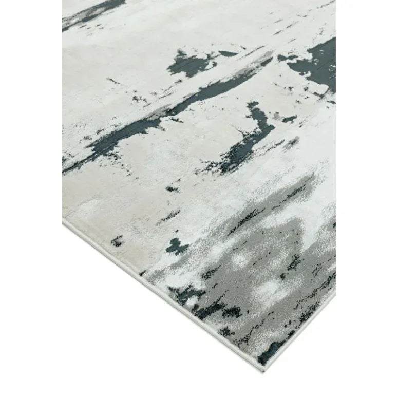 Modern abstract rug with grey and black brushstroke pattern on beige background, corner view