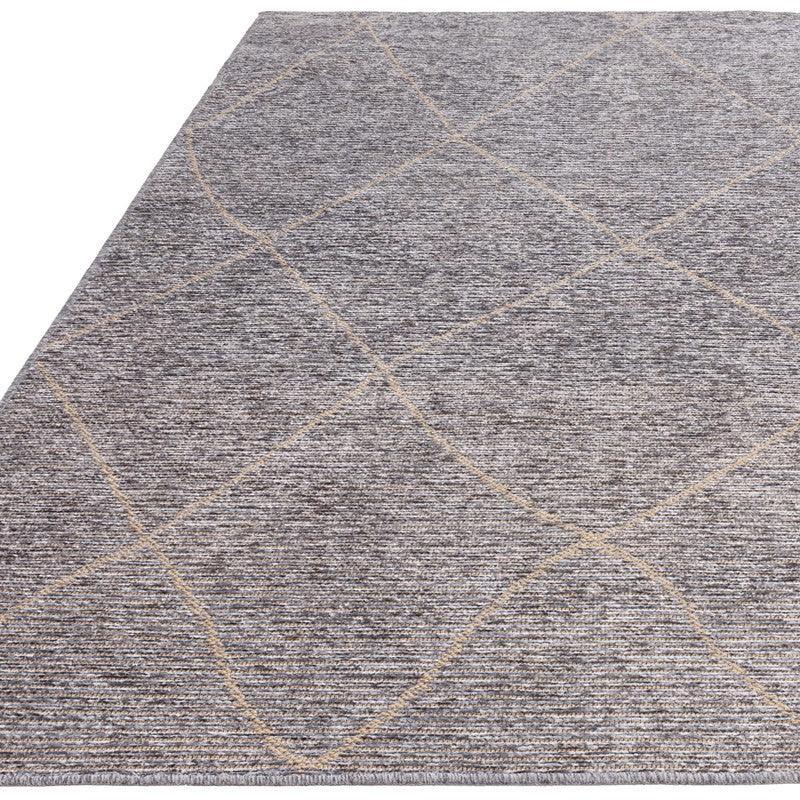 Grey area rug with subtle diamond pattern and linear texture, corner angled view
