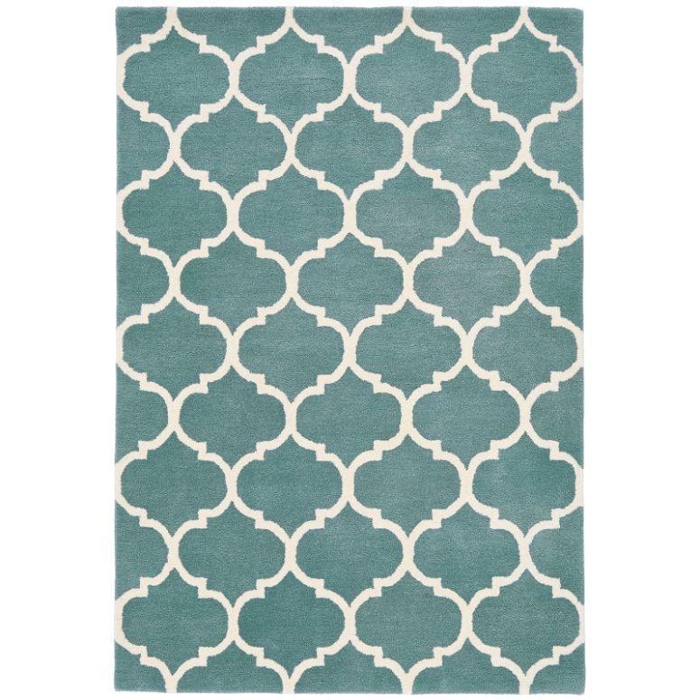 Blue area rug with white trellis pattern and rectangular shape