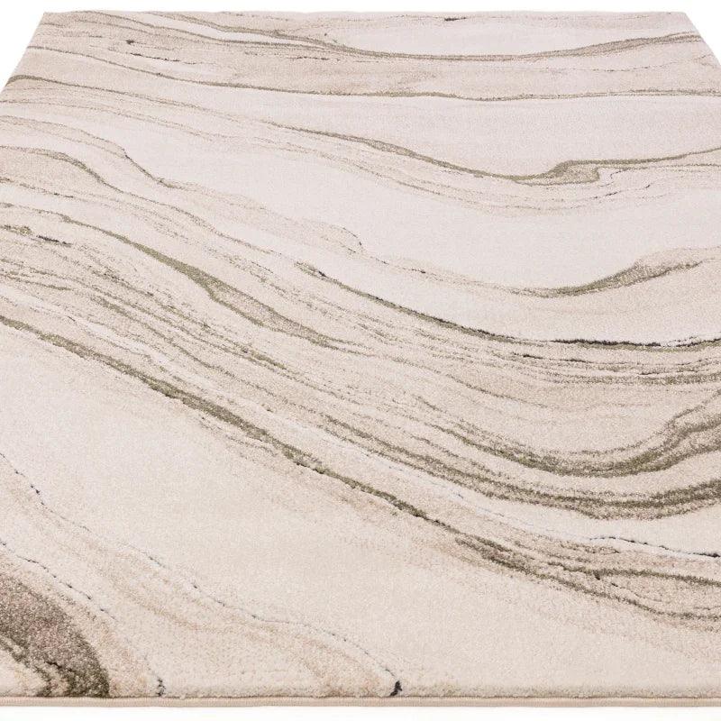 Beige and cream area rug with abstract marble pattern and subtle green accents