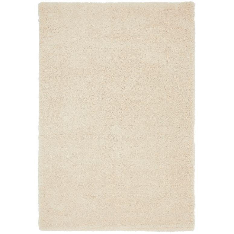 Rectangular cream shaggy rug with soft textured surface
