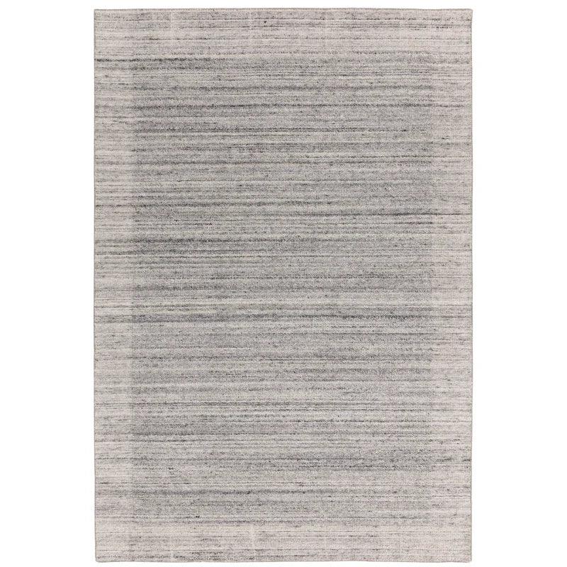 Grey area rug with subtle horizontal striped texture and soft woven fabric