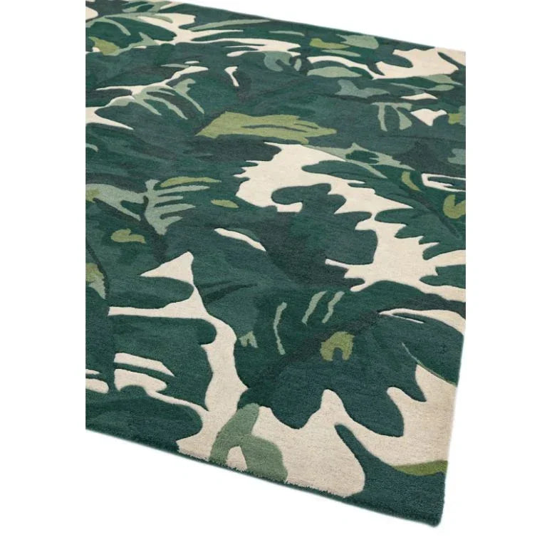green leaf pattern area rug with cream background