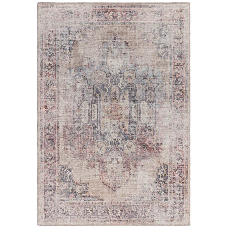 Vintage style area rug with faded blue, beige, and red medallion pattern