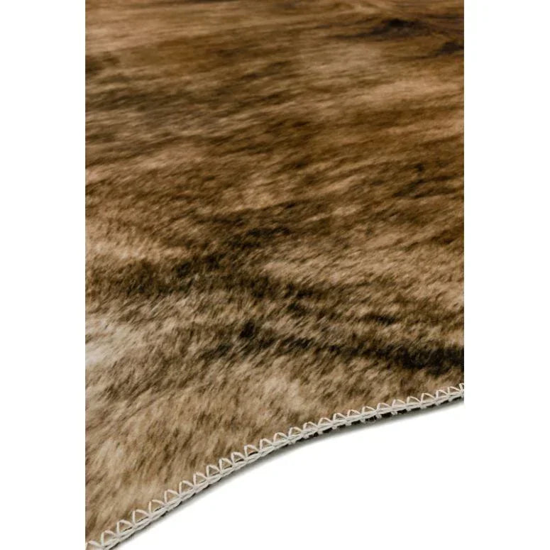Brown faux fur rug with stitched edge on a white background