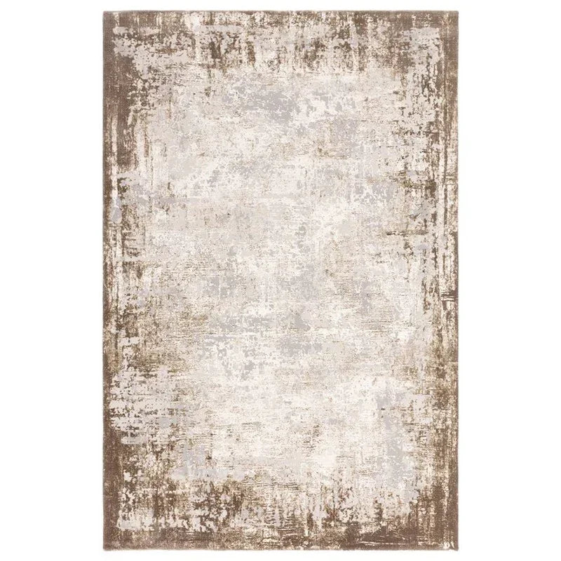 Beige and brown abstract patterned area rug with distressed finish