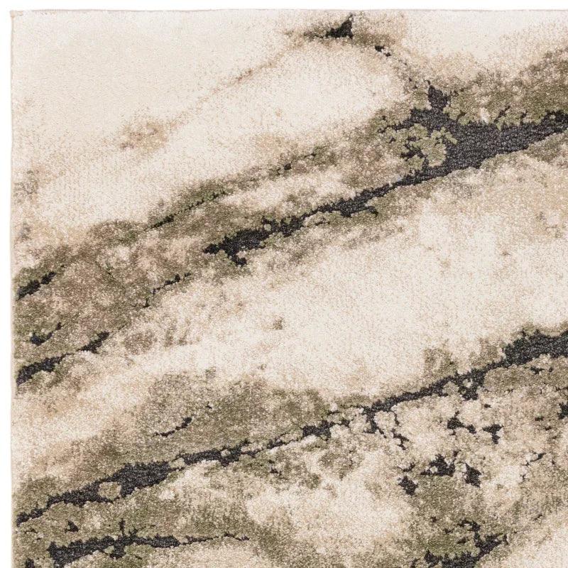 Cream and beige abstract rug with marbled pattern and black accents, corner view