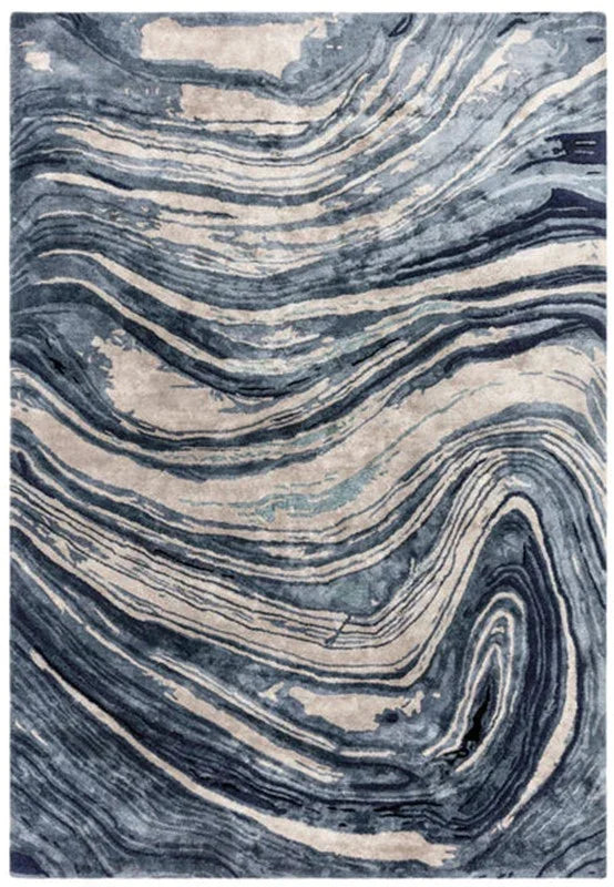 Blue and grey abstract area rug with marble swirl pattern and soft texture