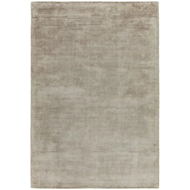 Large rectangular beige rug with subtle texture and soft pile