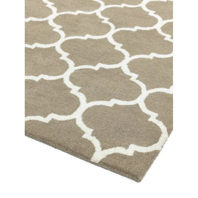 Beige area rug with white geometric lattice pattern and soft pile