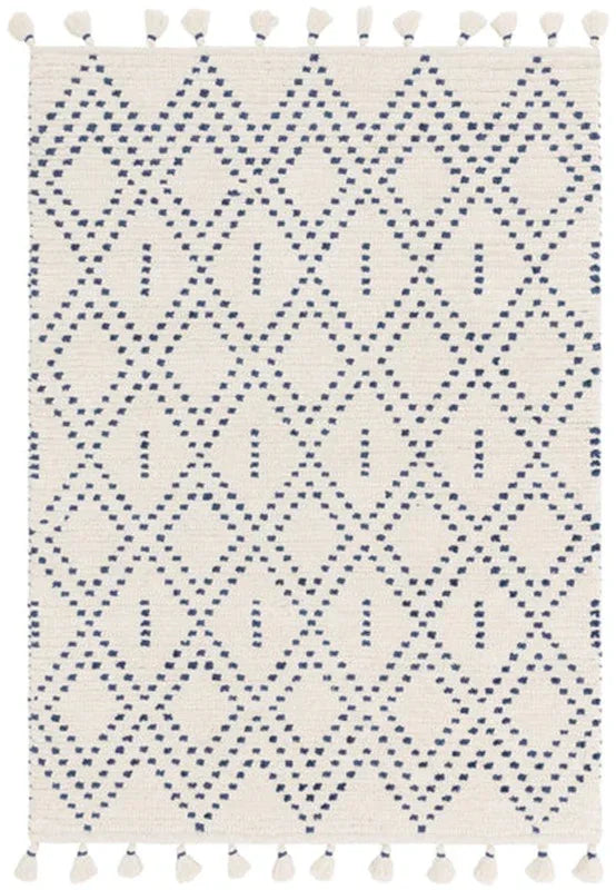 cream and navy geometric patterned rug with diamond shapes and tasselled edges