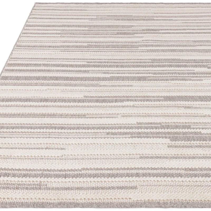Beige and grey striped area rug with textured woven pattern