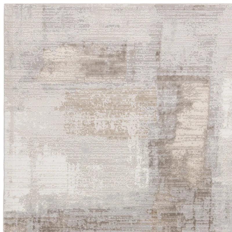 Neutral abstract area rug with beige and grey tones in a modern textured pattern