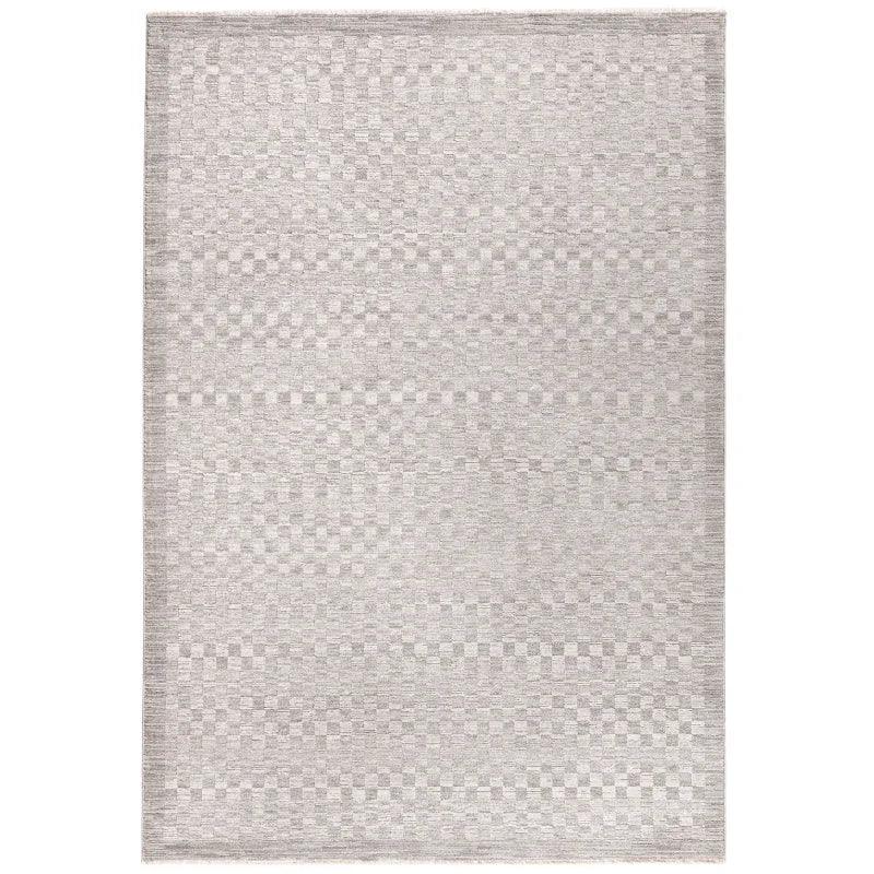 Light grey area rug with subtle checkerboard pattern and soft textured pile