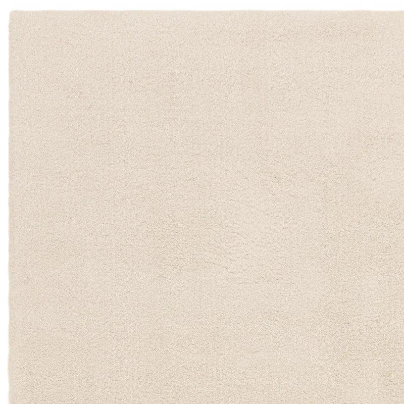 cream shaggy rug close up showing soft textured pile