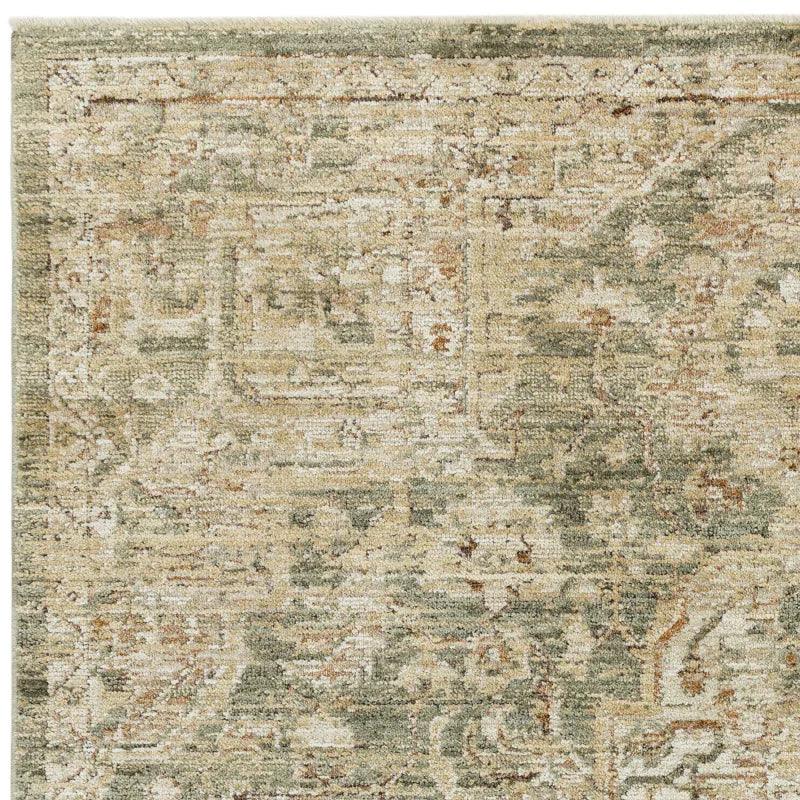 Green and beige patterned rug close-up showing textured woven design