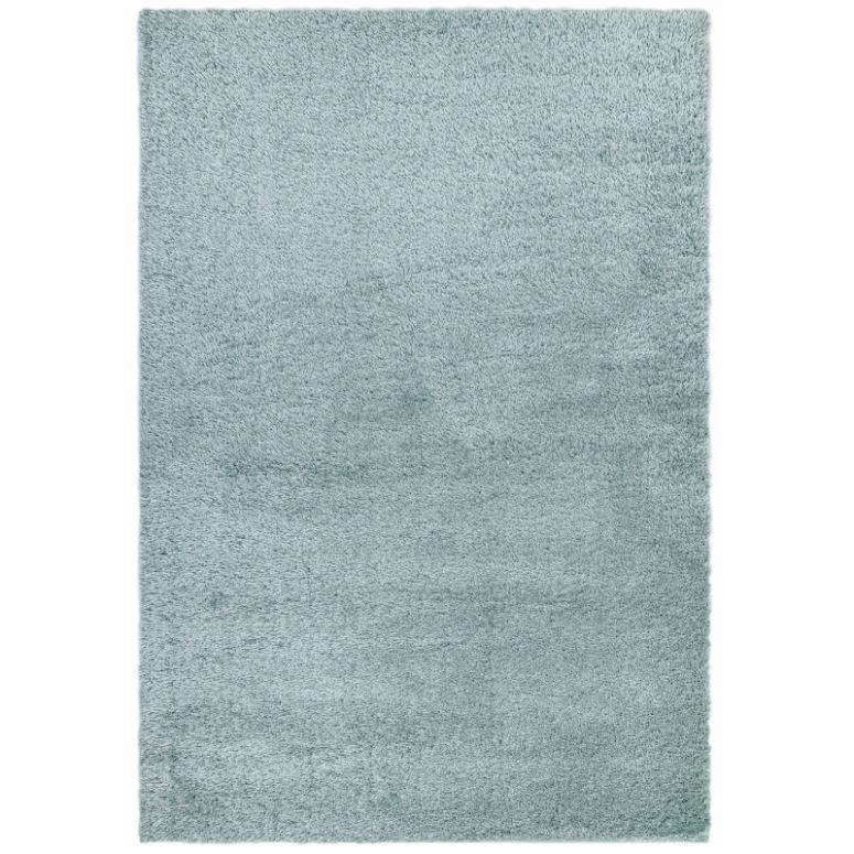 Light blue shaggy area rug with soft texture and rectangular shape