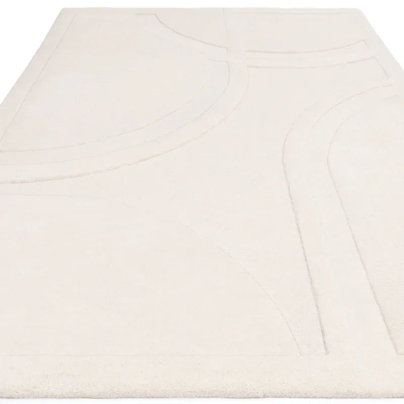 Cream abstract pattern rug with raised geometric details