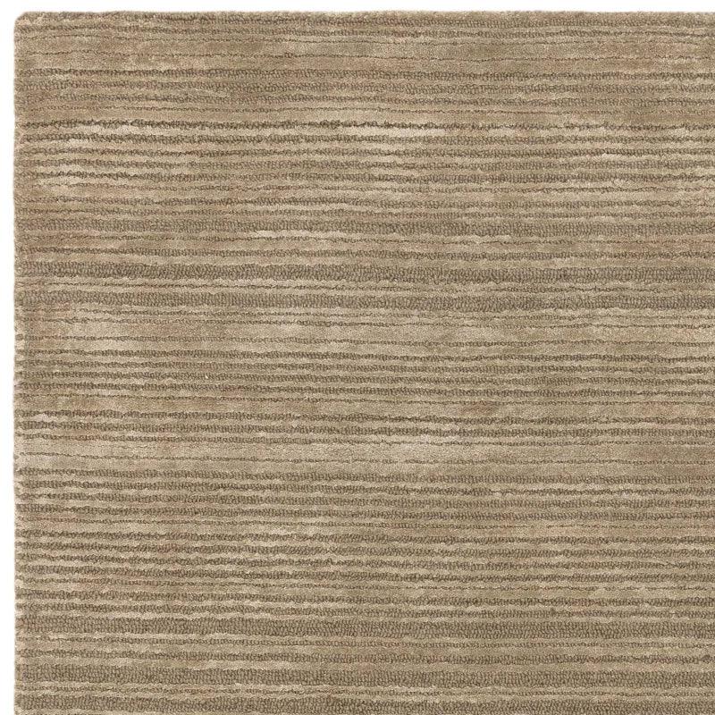 Beige textured area rug with subtle horizontal stripe pattern