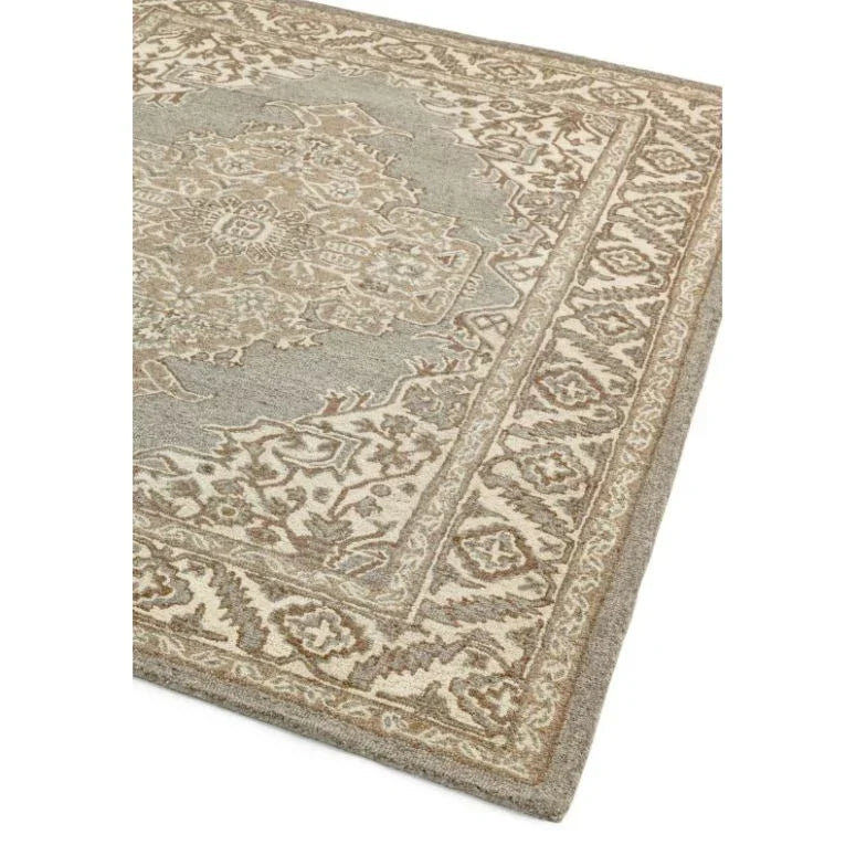 Traditional area rug with beige and grey floral pattern and decorative border
