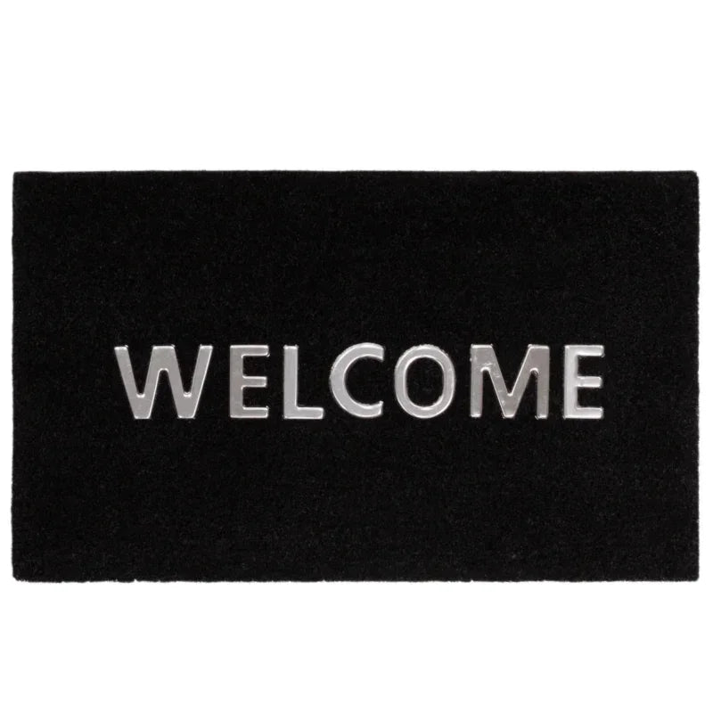 Black welcome doormat with large silver lettering for entryway