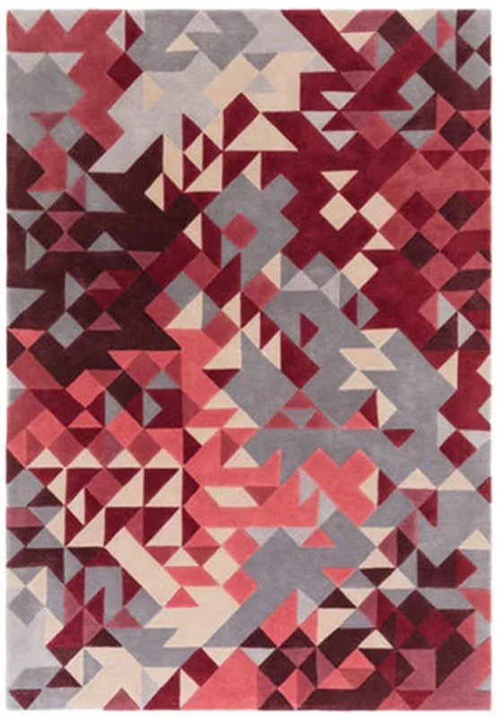 Geometric area rug with red, grey, and beige triangles and abstract pattern