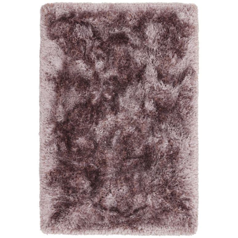 Rectangular shaggy rug with thick pile in soft mauve color, top view