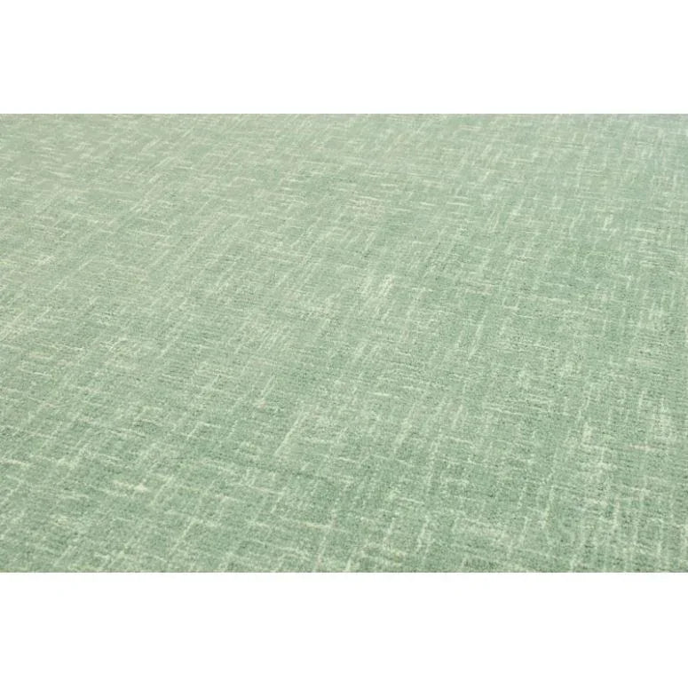 Light green textured fabric upholstery close-up showing crosshatch weave details