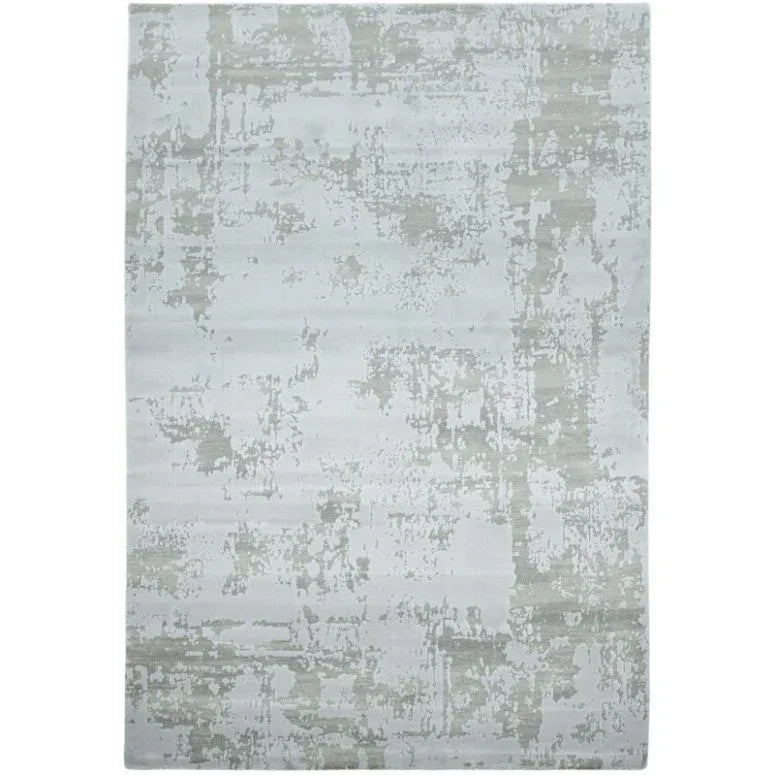 Grey abstract patterned area rug with textured design on a light background