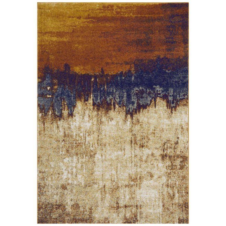 Abstract area rug with gold, navy, and beige gradient pattern