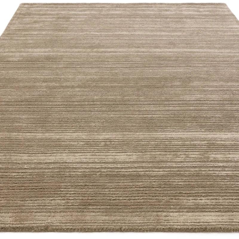Beige striped area rug with textured wool surface and subtle linear pattern