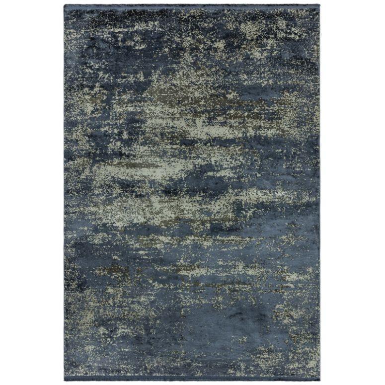 Blue and grey abstract area rug with textured pattern