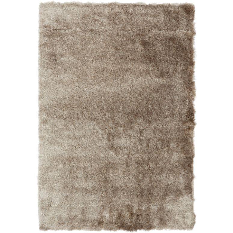 Beige shaggy area rug with soft, high pile texture, shown from a top-down view