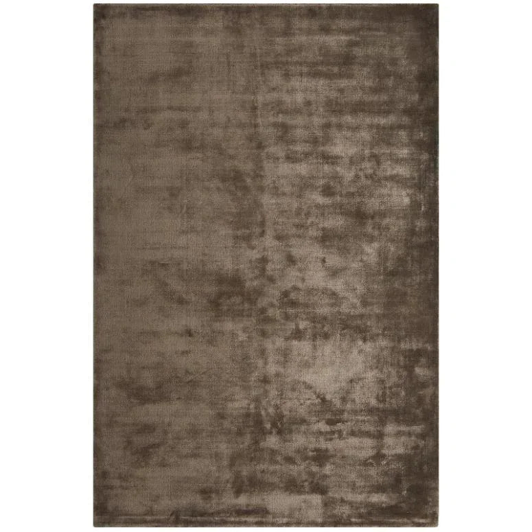 Taupe brown area rug with soft velvet texture and rectangular shape
