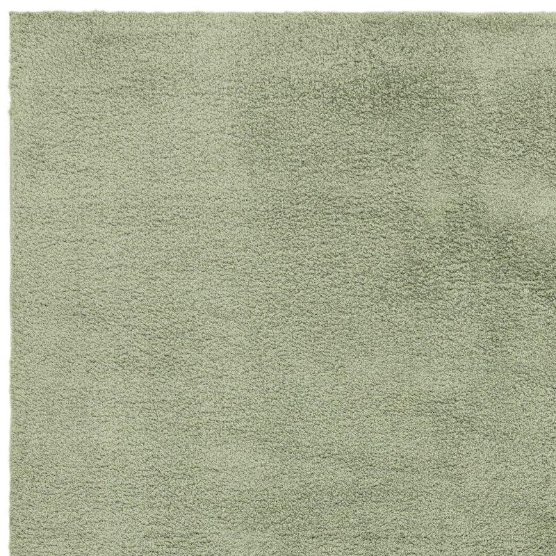 sage green shaggy rug with soft texture closeup