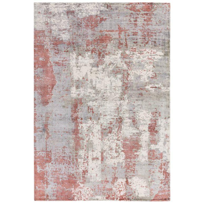 Modern area rug with abstract red, grey, and white pattern, rectangular shape