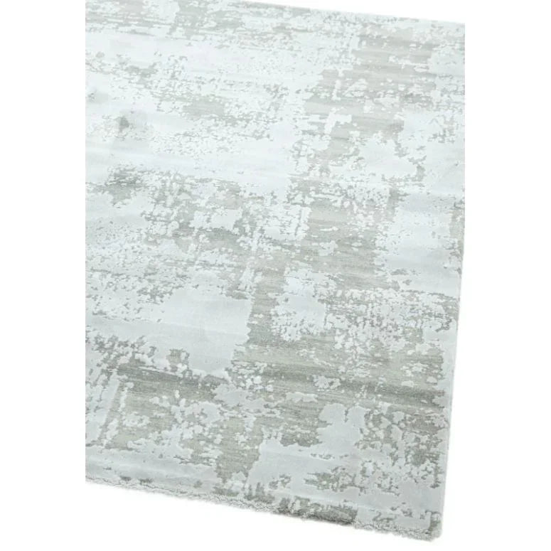 Light grey abstract area rug with textured pattern and soft finish